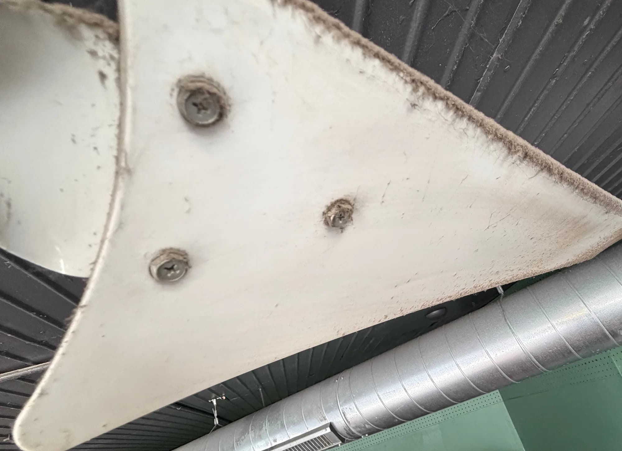 Ceiling fan blade with heavy buildup along the trailing edge